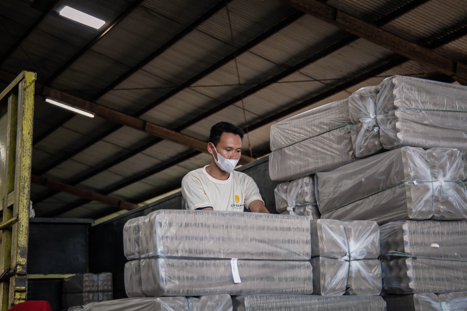 Interior of a shipping container loaded with boxes